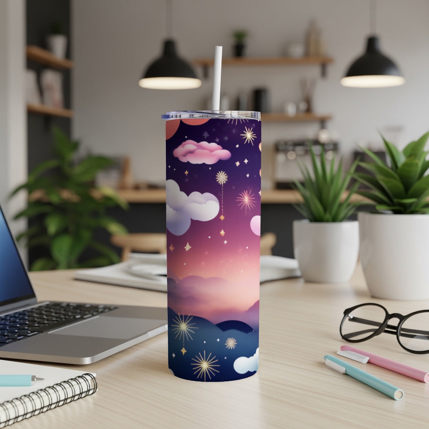 Tall tumbler with a starry night sky and cloud design.