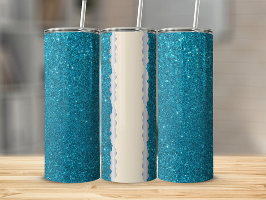 Three teal glitter tumblers with straw on a wooden surface.
