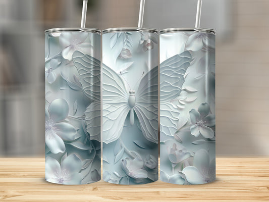 Three skinny tumblers with embossed butterflies and flowers.