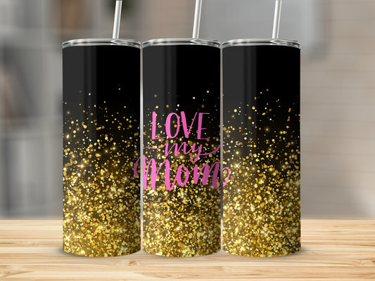 Black tumbler with pink "Love my Mom" text and gold glitter.