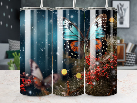 Tumbler featuring a detailed blue and orange butterfly on a pine branch.