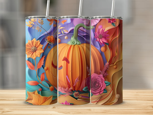 Three Halloween-themed tumblers with pumpkins and floral designs.