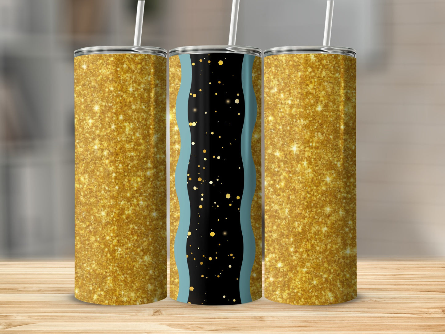 Three glitter tumblers with straws, one with blue and gold accents.