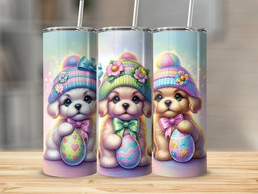 Three puppies in colorful hats hold Easter eggs, with hats featuring pom-poms and flowers.