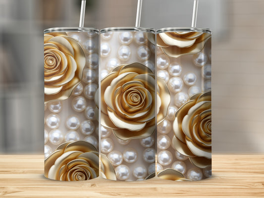 Three gold rose and pearl tumblers on a wooden surface.