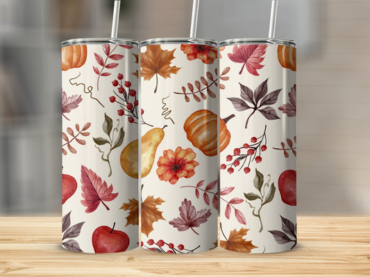 Three tumblers with autumn leaf and pumpkin pattern.