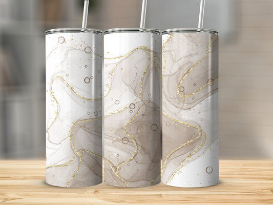 Three tumblers with marbled brown and gold abstract design and straws.