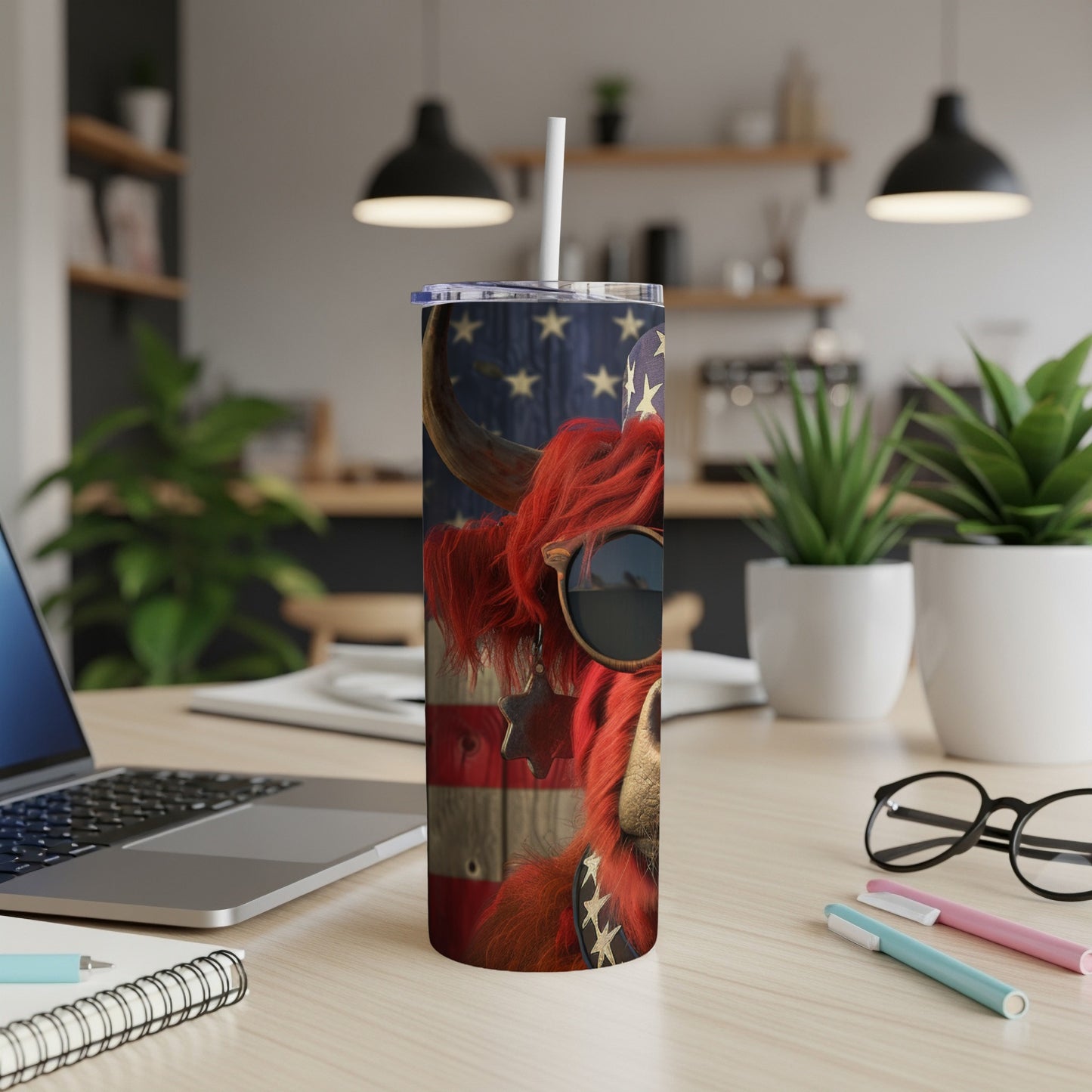 American flag themed bull wearing sunglasses on a tumbler.