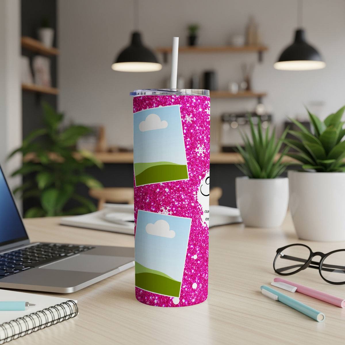 Pink glitter tumbler with two photo frames and a straw.