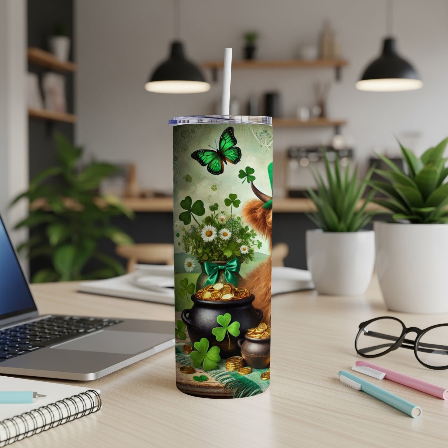 Highland cow with shamrocks and gold coins on a St. Patrick's Day tumbler.
