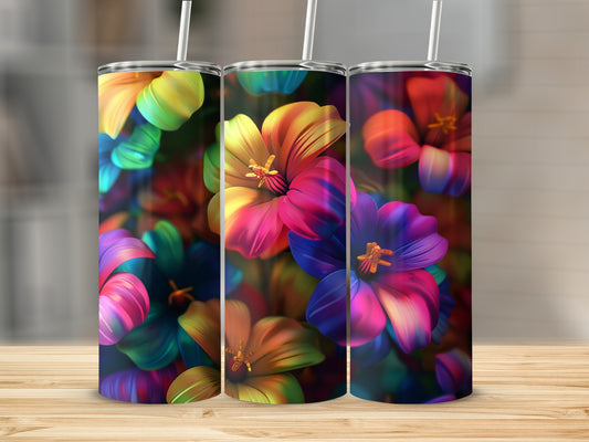 Three tumblers with vibrant, rainbow-colored hibiscus flowers.