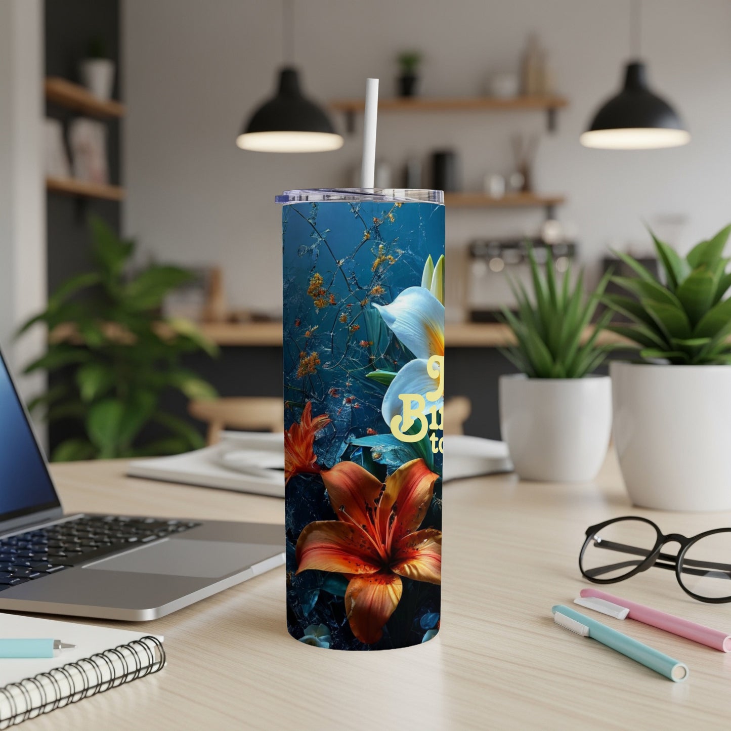 Tumbler with vibrant orange lily and white flower, "Bright to you" text.