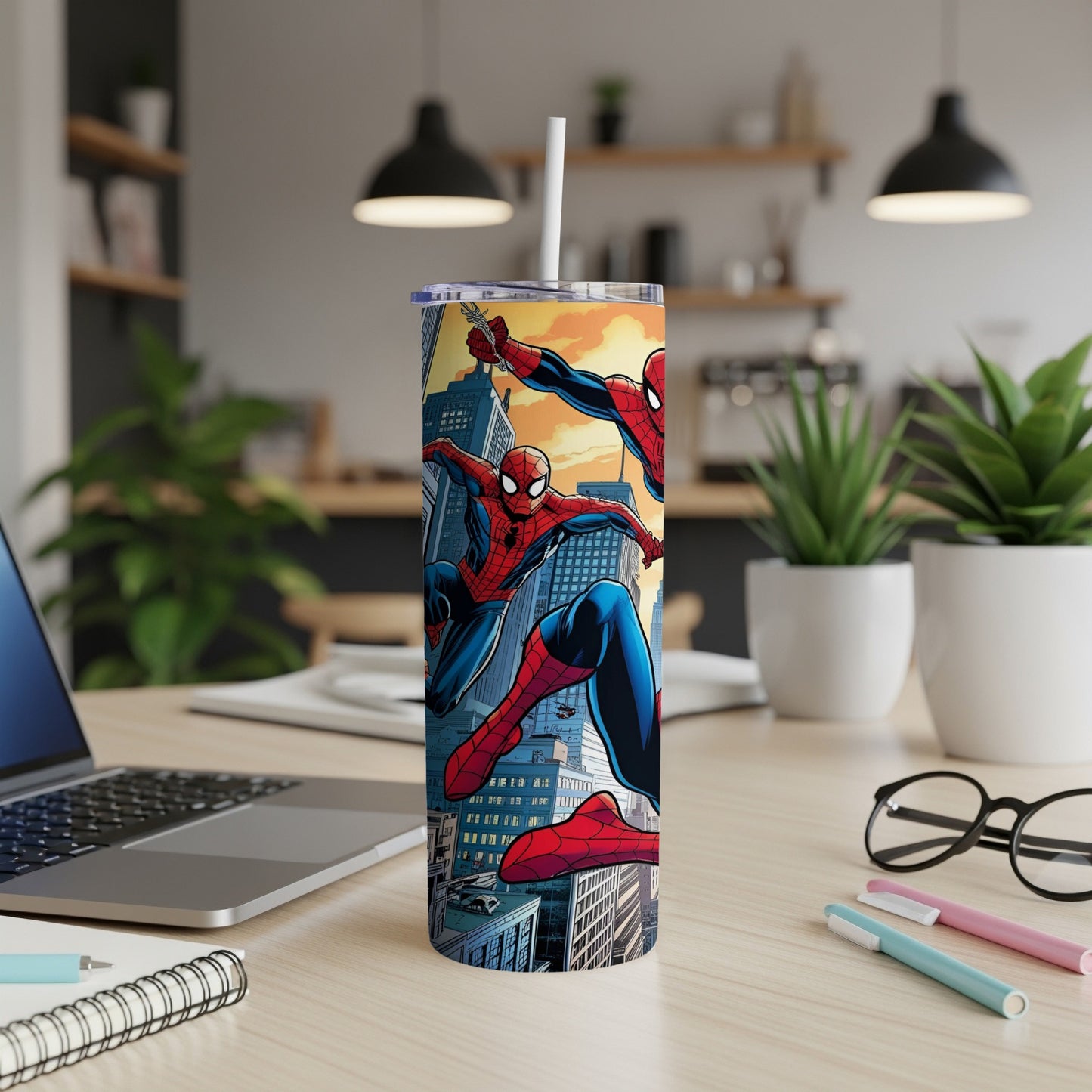 Spider-Man swings through a city skyline on a white tumbler with a straw.