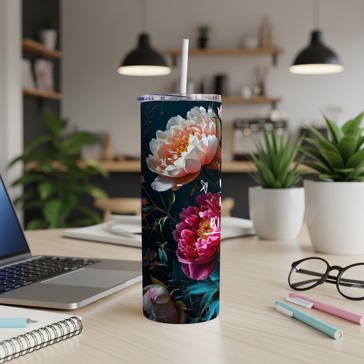 Dark tumbler with pink and white peonies and green leaves.
