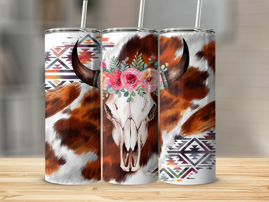 Three tumblers featuring a cowhide pattern and floral bull skull design.