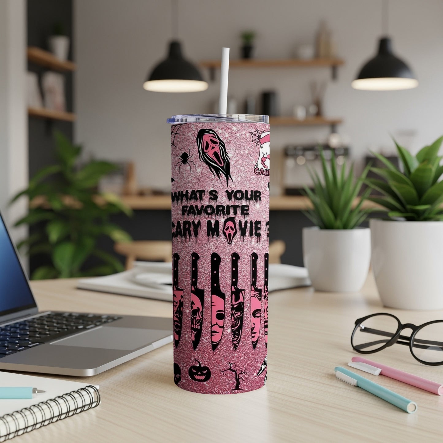 Pink glitter tumbler with "What's your favorite scary movie?" and horror movie icons.