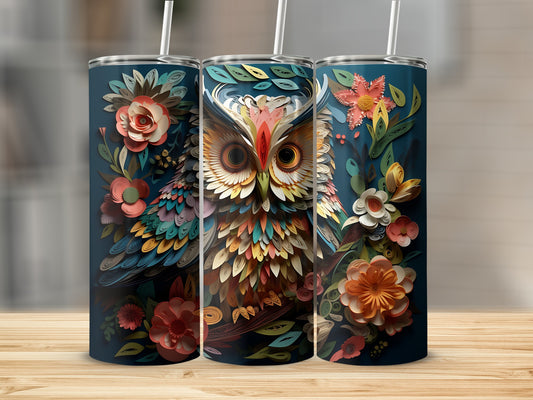 Owl and floral design on three dark blue tumblers with straws.
