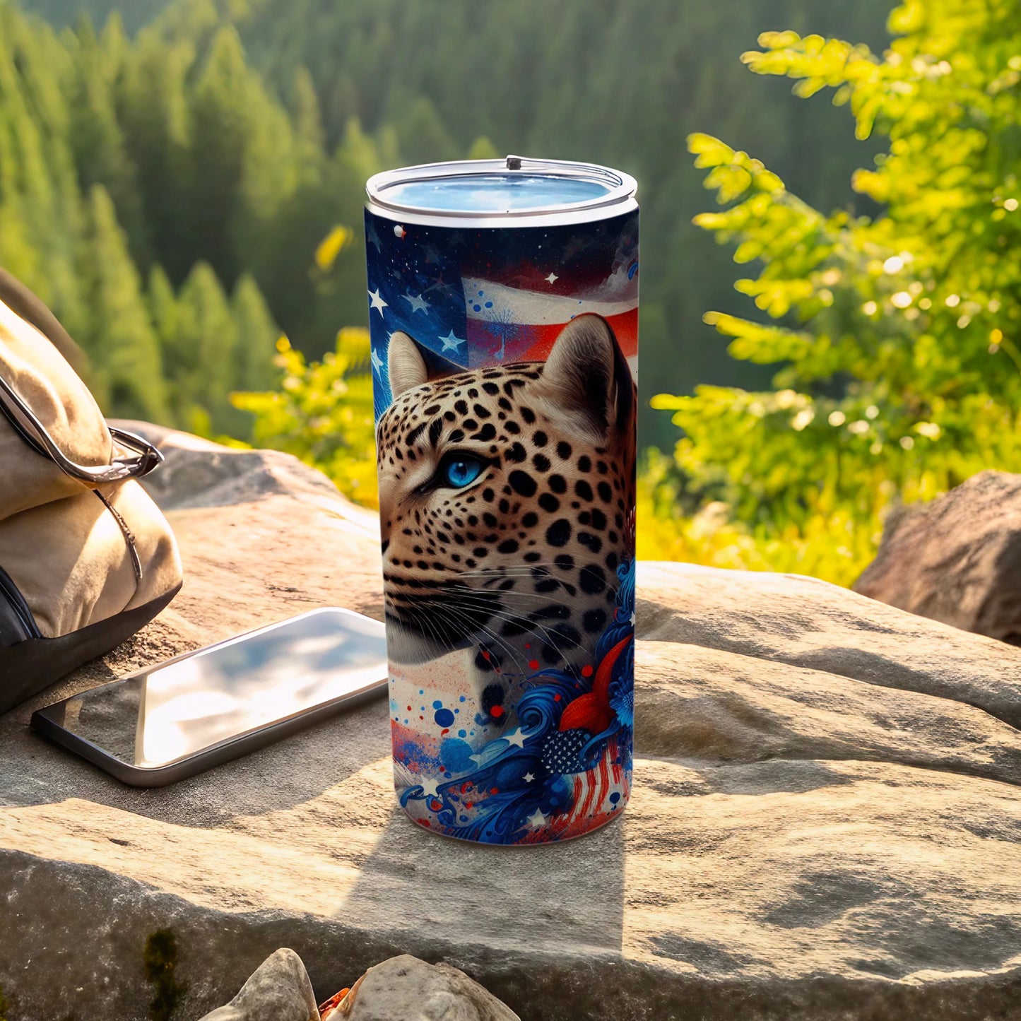 Leopard print tumbler with American flag design on rocky surface.