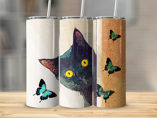 Black cat with yellow eyes peeking around a corner on a tumbler with butterflies.