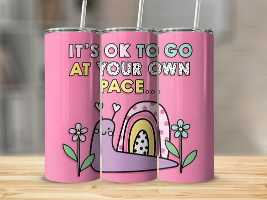Pink tumbler with snail, rainbow, flowers, and text.