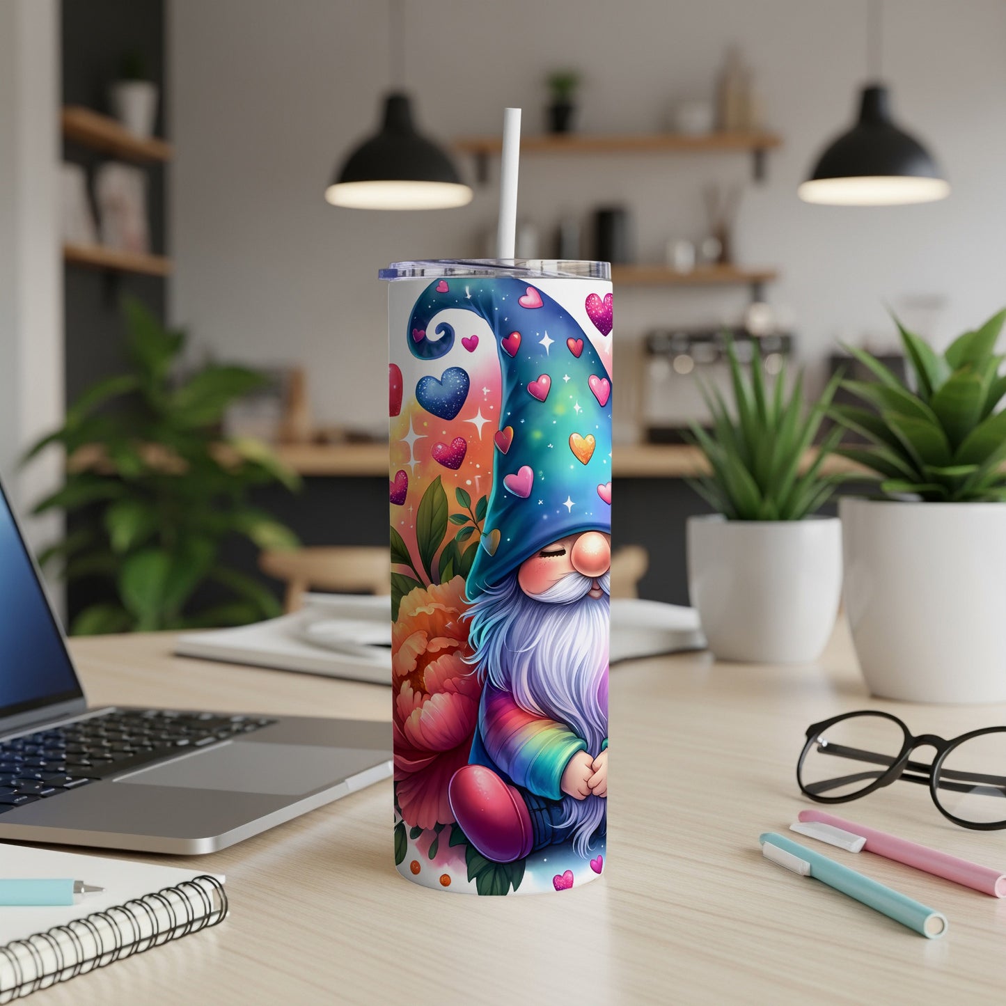 Colorful gnome with hearts and flowers on a white skinny tumbler.