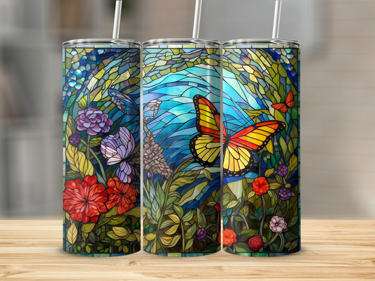 Three stained glass tumblers with butterflies and floral designs.