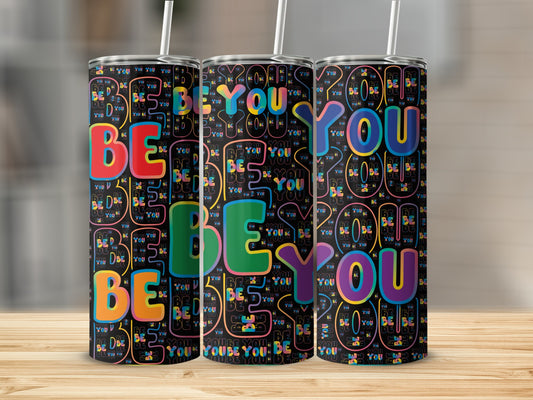 Three tumblers with "Be You" text in colorful, abstract patterns.