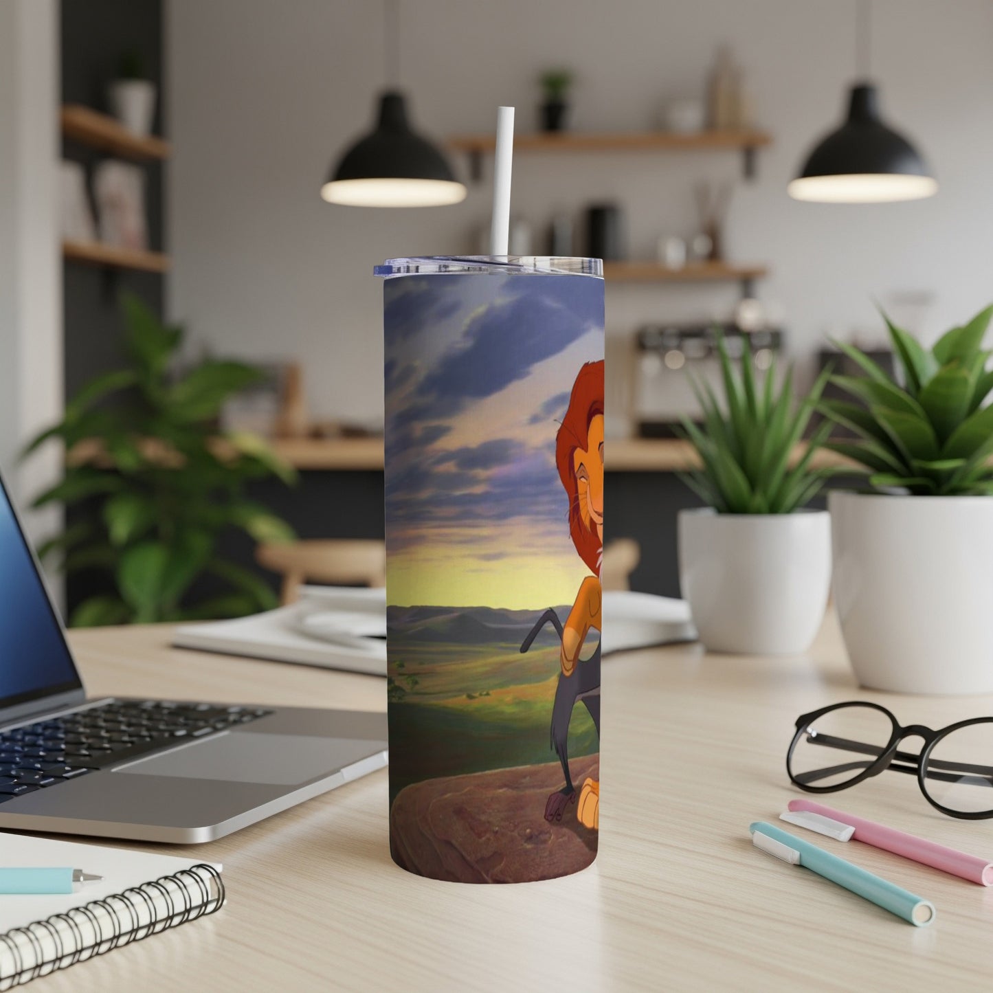 Simba from The Lion King on a rock at sunset, on a white tumbler.