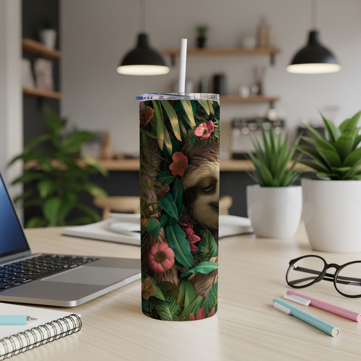 Tall tumbler with a sloth face and tropical flowers design.