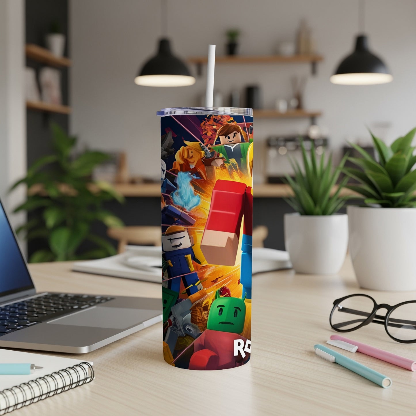 Roblox characters on a skinny tumbler with a white straw.