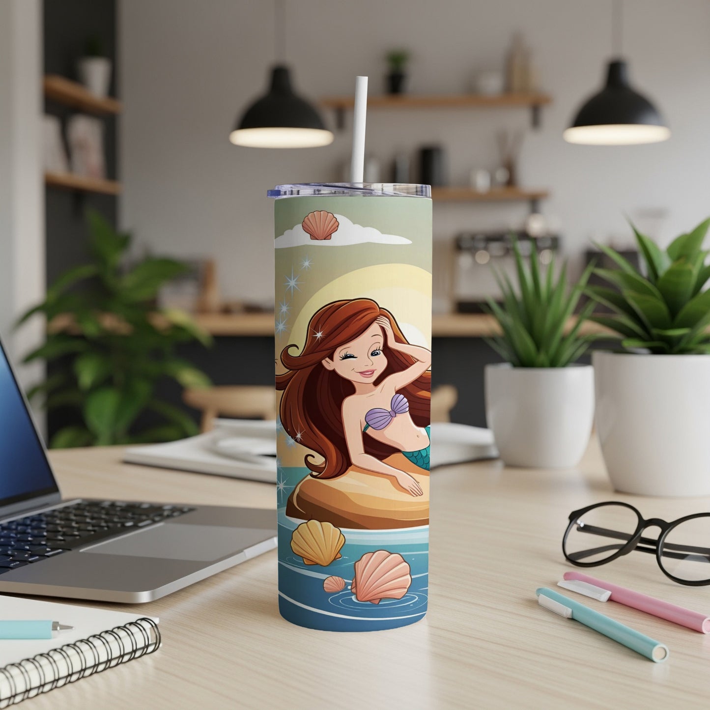 Mermaid on a rock with seashells and pastel sky, on a tumbler.