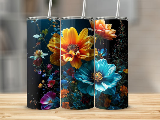 Three tumblers with vibrant floral designs against a dark background.