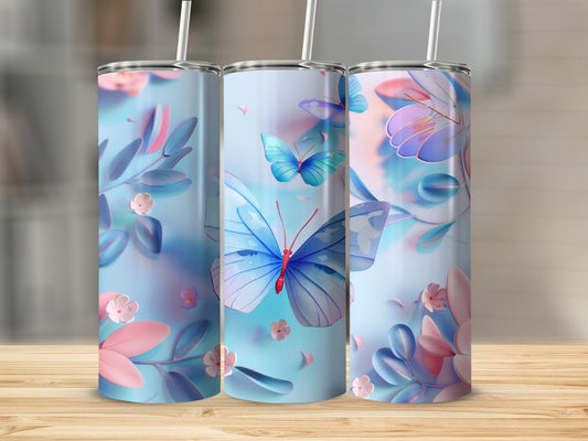 Three tumblers with blue butterflies and floral designs.