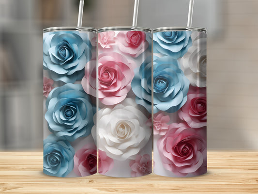 Three tumblers with layered blue, pink, and white floral designs.