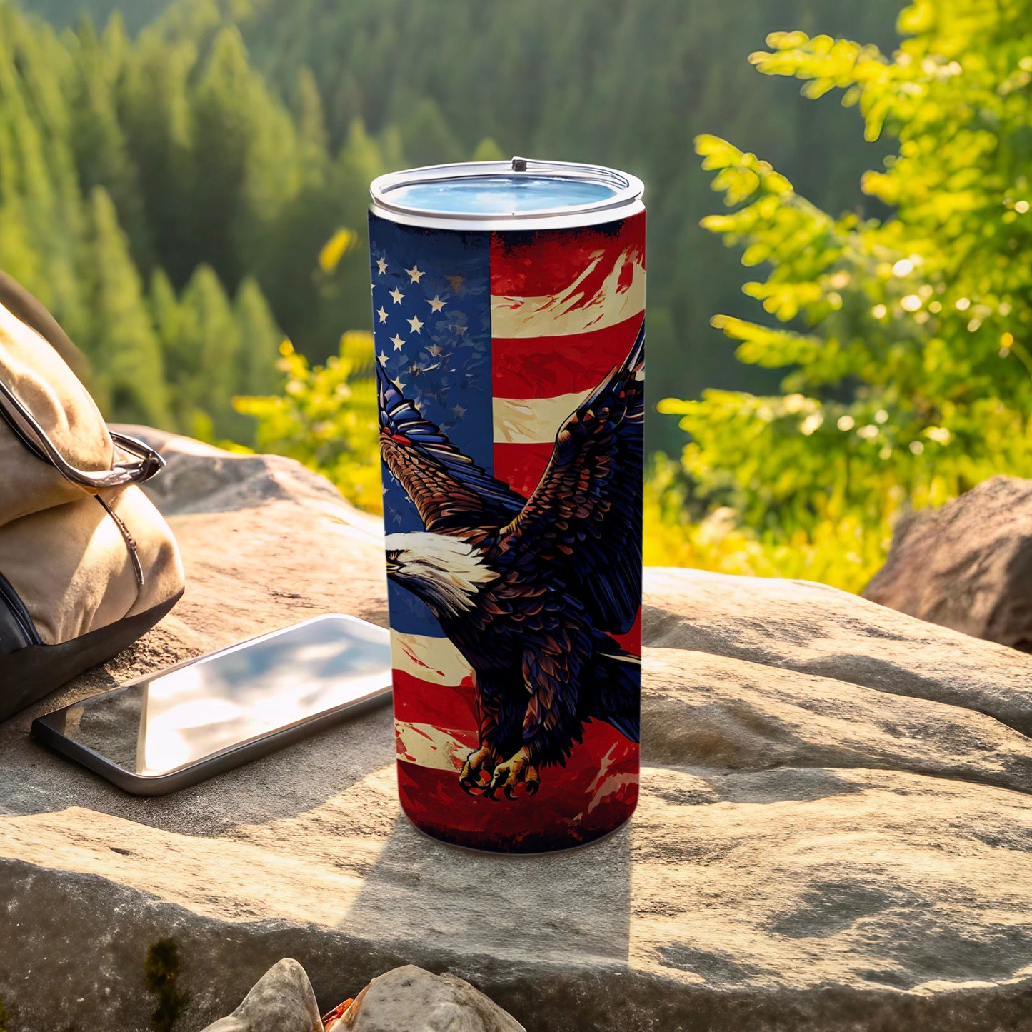 Eagle and American flag design on a stainless steel tumbler.