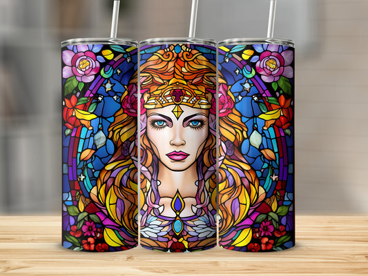 Stained glass tumbler with a portrait of a queen and floral accents.