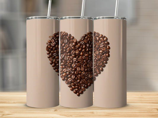 Three tumblers with a heart made of coffee beans on a wooden surface.