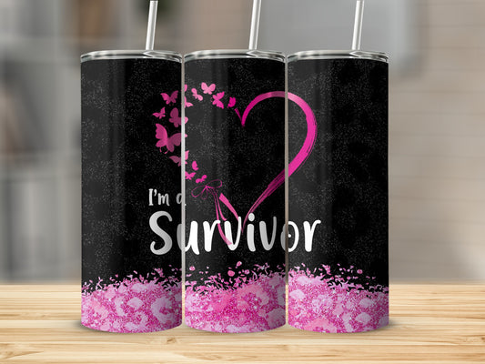 Black tumbler with pink breast cancer ribbon and "I'm a Survivor" text.
