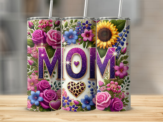Three tumblers featuring "MOM" in glittery purple letters surrounded by floral designs.