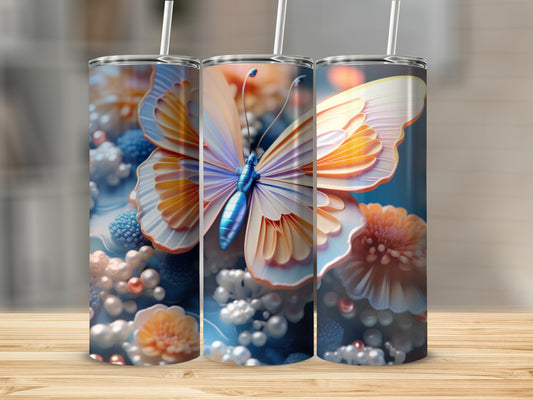 Three tumblers with a vibrant butterfly and floral design.