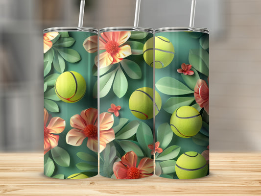 Green tumbler with tennis balls and floral pattern.