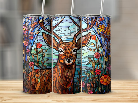 Stained glass tumbler with deer and floral design.