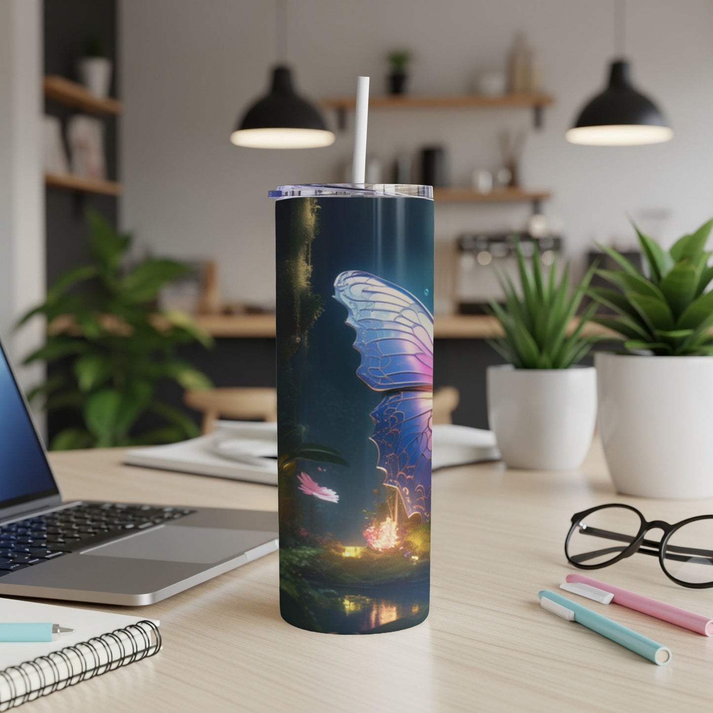 Tall, dark tumbler with a glowing butterfly design and forest scene.