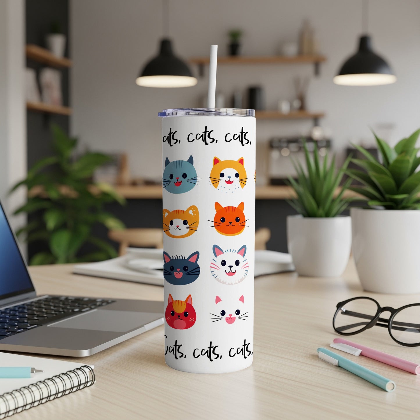 White tumbler with colorful cat faces and "cats, cats, cats" text.