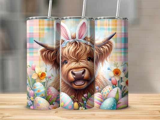 Highland cow with bunny ears surrounded by Easter eggs and flowers.