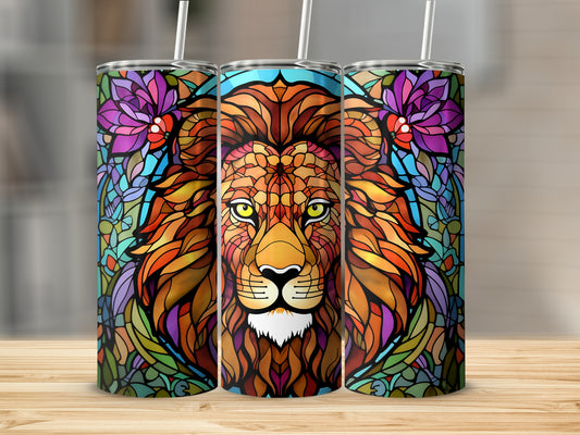 Stained glass lion's face surrounded by colorful flowers on a tumbler.