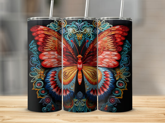 Black tumbler with colorful embroidered butterfly design.