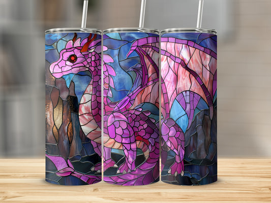 Stained glass dragon tumbler with pink wings on a wooden surface.