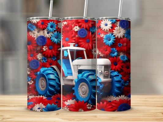 White tractor with blue wheels surrounded by red and blue flowers.