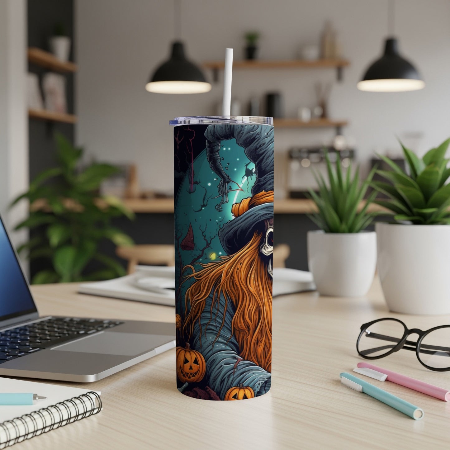 Tumbler with a Halloween witch illustration featuring pumpkins and a spooky background.
